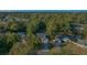 Bird's eye view of home, nestled among trees and featuring a well-manicured lawn and inviting curb appeal at 6009 Sw 107Th St, Ocala, FL 34476