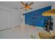 Bright bedroom with tile floors, neutral walls, storage, and a pet play area at 6009 Sw 107Th St, Ocala, FL 34476