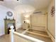 Bedroom with carpet, decorative fireplace, and natural lighting at 6701 Se 99Th Pl, Belleview, FL 34420