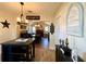 Open-concept dining area with kitchen island connects seamlessly to living areas at 6701 Se 99Th Pl, Belleview, FL 34420