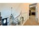 View from the top of the stairs looking into the foyer and entry door at 6701 Se 99Th Pl, Belleview, FL 34420