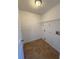 Laundry room with tile floors and wire shelving at 73 Fir Dr, Ocala, FL 34472