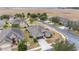 Aerial view of a single Gathering home with a garage and landscaping at 7358 Sw 101St Ave, Ocala, FL 34481