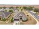 Aerial view of a single Gathering home with a garage and landscaping at 7358 Sw 101St Ave, Ocala, FL 34481