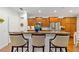 Island kitchen with granite countertops and breakfast bar seating at 7358 Sw 101St Ave, Ocala, FL 34481
