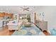 Light and airy living room with hardwood floors and ceiling fan at 7358 Sw 101St Ave, Ocala, FL 34481