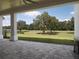 Spacious covered patio overlooks the golf course at 7647 Nw 33Rd Pl, Ocala, FL 34482