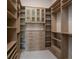 Large walk-in closet with ample shelving and hanging space at 7647 Nw 33Rd Pl, Ocala, FL 34482