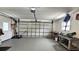 Spacious garage with ample storage and workbench at 8512 Sw 107Th Pl, Ocala, FL 34481