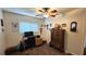 Bright home office features built-in shelving and a comfortable workspace at 8512 Sw 107Th Pl, Ocala, FL 34481