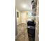 Laundry room with washer, dryer, and storage shelving at 8512 Sw 107Th Pl, Ocala, FL 34481