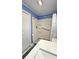 Bright bathroom featuring a walk-in shower with grab bar and white vanity at 8512 Sw 107Th Pl, Ocala, FL 34481