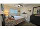 Bedroom with a double bed, carpet floor, window, dresser, and decorated walls at 8512 Sw 107Th Pl, Ocala, FL 34481