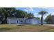 Charming single-story home with a well-manicured lawn and a one-car garage at 8512 Sw 107Th Pl, Ocala, FL 34481