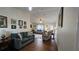 Open concept living room featuring comfortable seating, lots of light and laminate floors at 8512 Sw 107Th Pl, Ocala, FL 34481