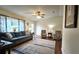 Living room with ample natural light and cozy seating at 8512 Sw 107Th Pl, Ocala, FL 34481