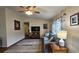 Bright living room featuring stylish decor, comfortable seating, and wood-look flooring at 8512 Sw 107Th Pl, Ocala, FL 34481