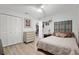 Clean bedroom with ample closet space, dresser, and an accent headboard at 8723 Sw 93Rd Ln # C, Ocala, FL 34481