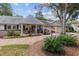 Charming single story home showcasing manicured landscaping, quaint front porch and attached two car garage at 8723 Sw 93Rd Ln # C, Ocala, FL 34481