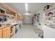 Organized garage with workshop area and storage at 8723 Sw 93Rd Ln # C, Ocala, FL 34481