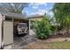 Garage with storage shed and golf cart at 8723 Sw 93Rd Ln # C, Ocala, FL 34481
