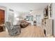 Cozy living room with hardwood floors, comfortable seating, and a relaxed atmosphere for relaxation at 8723 Sw 93Rd Ln # C, Ocala, FL 34481