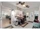 Sunroom with view into kitchen, workspace, and backyard access at 8723 Sw 93Rd Ln # C, Ocala, FL 34481