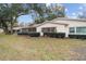 Ranch home with screened patio and landscaped yard at 8851 Sw 92Nd Pl # E, Ocala, FL 34481