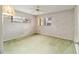 Simple bedroom with light-colored walls and carpet at 8851 Sw 92Nd Pl # E, Ocala, FL 34481
