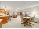 Open concept kitchen and dining area with breakfast bar and seating at 8851 Sw 92Nd Pl # E, Ocala, FL 34481