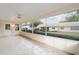 Spacious screened porch overlooking the backyard at 8851 Sw 92Nd Pl # E, Ocala, FL 34481