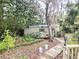 Wooden walkway to shed in backyard at 1040 Se 9Th Ave, Ocala, FL 34471