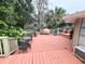 Spacious deck with seating area and grill at 1040 Se 9Th Ave, Ocala, FL 34471