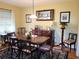 Formal dining room with elegant furniture and hardwood floors at 1040 Se 9Th Ave, Ocala, FL 34471