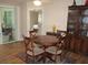 Bright dining area with round table and four chairs, near the kitchen at 11388 Sw 138Th Ln, Dunnellon, FL 34432