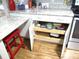 White kitchen cabinets with pull-out drawers, great for storage at 11388 Sw 138Th Ln, Dunnellon, FL 34432