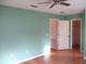 Bedroom with hardwood floors and spacious closet at 11500 Sw 136Th Pl, Dunnellon, FL 34432