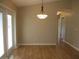 Dining area with hardwood floors and access to backyard at 11500 Sw 136Th Pl, Dunnellon, FL 34432