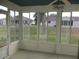 Bright sunroom offering backyard views at 11500 Sw 136Th Pl, Dunnellon, FL 34432