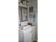 Bathroom with vanity and beach-themed decor at 137 Marion Oaks Ln, Ocala, FL 34473