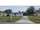 Ranch style home with solar panels and carport at 137 Marion Oaks Ln, Ocala, FL 34473