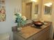 Bathroom featuring a unique vessel sink on a granite countertop at 13779 Sw 111Th Ave, Dunnellon, FL 34432