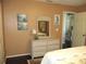 Bright bedroom with dresser and mirror at 13779 Sw 111Th Ave, Dunnellon, FL 34432