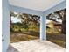 Covered patio overlooking backyard at 13824 Se 42 Ave, Summerfield, FL 34491