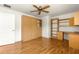 Bedroom with wood built-ins and hardwood floors at 13957 Se 86Th Cir, Summerfield, FL 34491