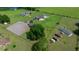 Expansive property featuring horse facilities, lush pastures, and well-maintained homes with swimming pools at 14130 Sw 8Th Ave, Ocala, FL 34473