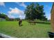 The property includes horses grazing in a fenced pasture, adding to the property's charm at 14130 Sw 8Th Ave, Ocala, FL 34473
