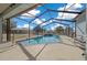 Inviting screened pool with spa and open view at 14130 Sw 8Th Ave, Ocala, FL 34473