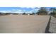 Large riding arena with a dirt surface and fencing at 14130 Sw 8Th Ave, Ocala, FL 34473