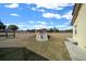 Concrete storm shelter tucked into the side yard at 14130 Sw 8Th Ave, Ocala, FL 34473